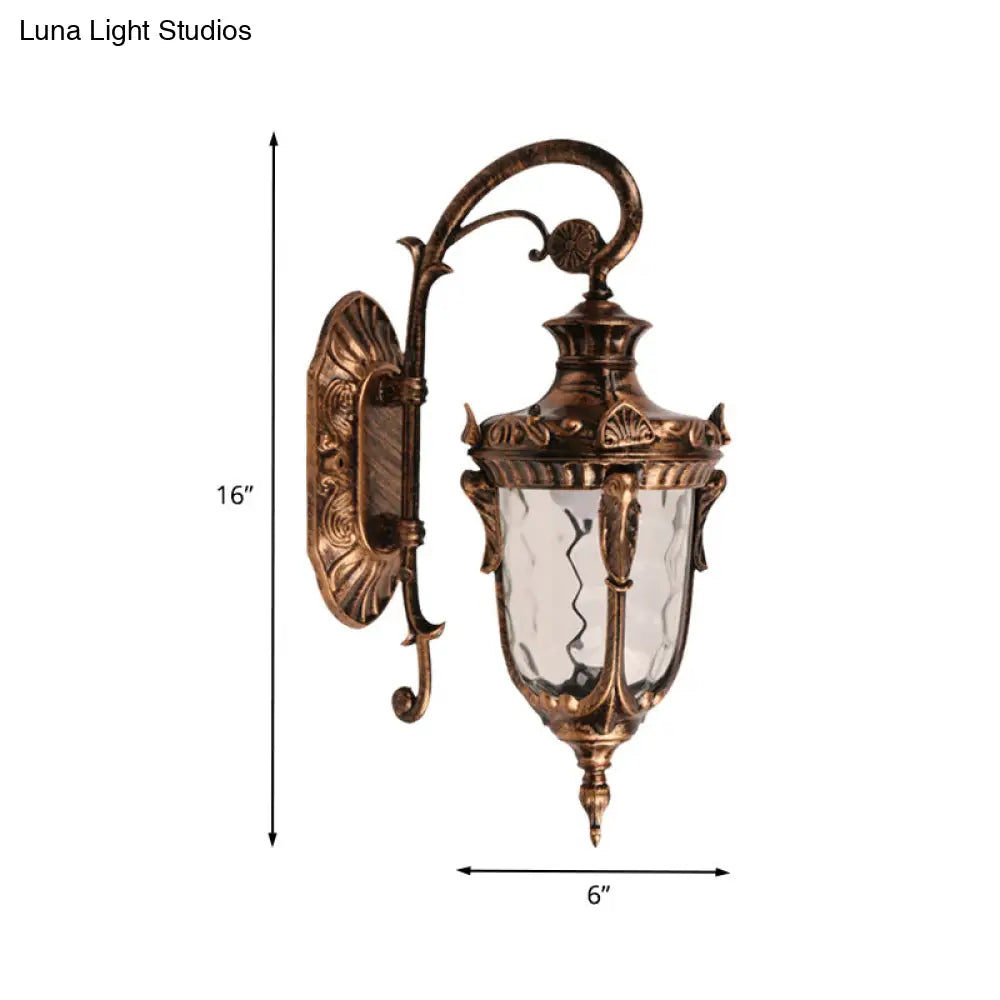 Acorn Glass Wall Sconce With Clear Water In Brass Finish