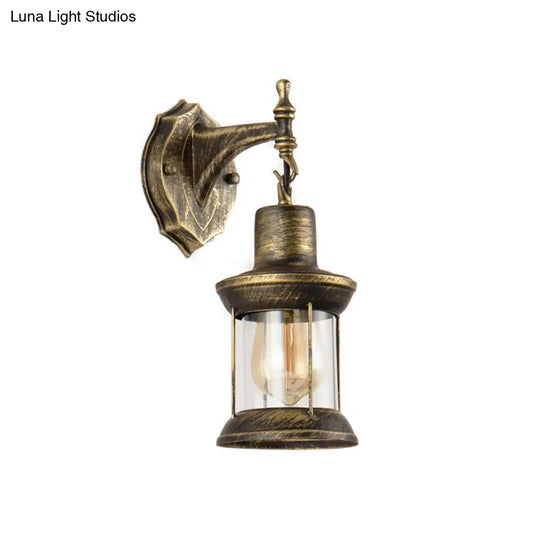 Aged Bronze Outdoor Sconce Lighting Fixture - Traditional Clear Glass Wall Light With Kerosene Shade