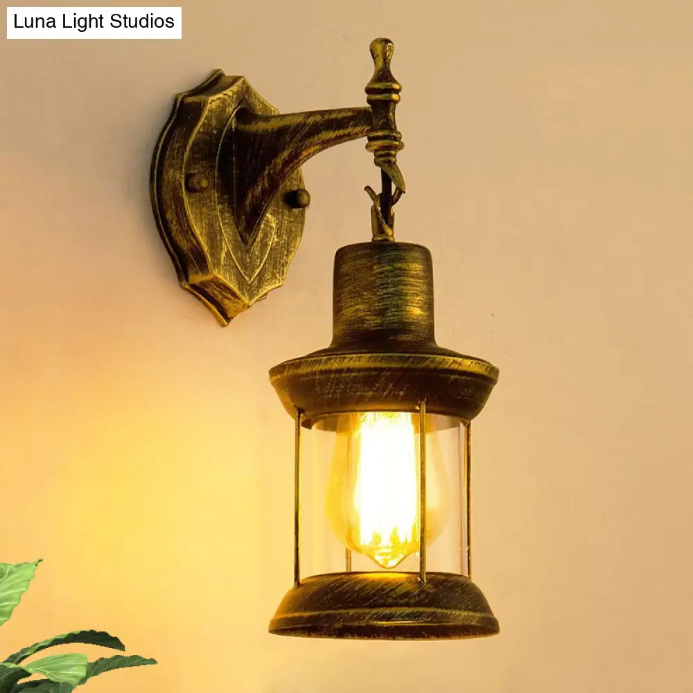 Aged Bronze Outdoor Sconce Lighting Fixture - Traditional Clear Glass Wall Light With Kerosene Shade