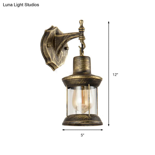 Aged Bronze Outdoor Sconce Lighting Fixture - Traditional Clear Glass Wall Light With Kerosene Shade