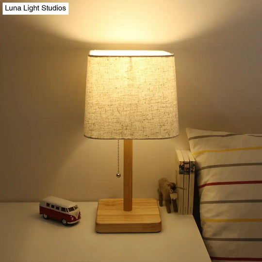 Nordic Wood Nightstand Lamp With Pull Chain For Bedroom - 1-Light Table Light Square Fabric Shade