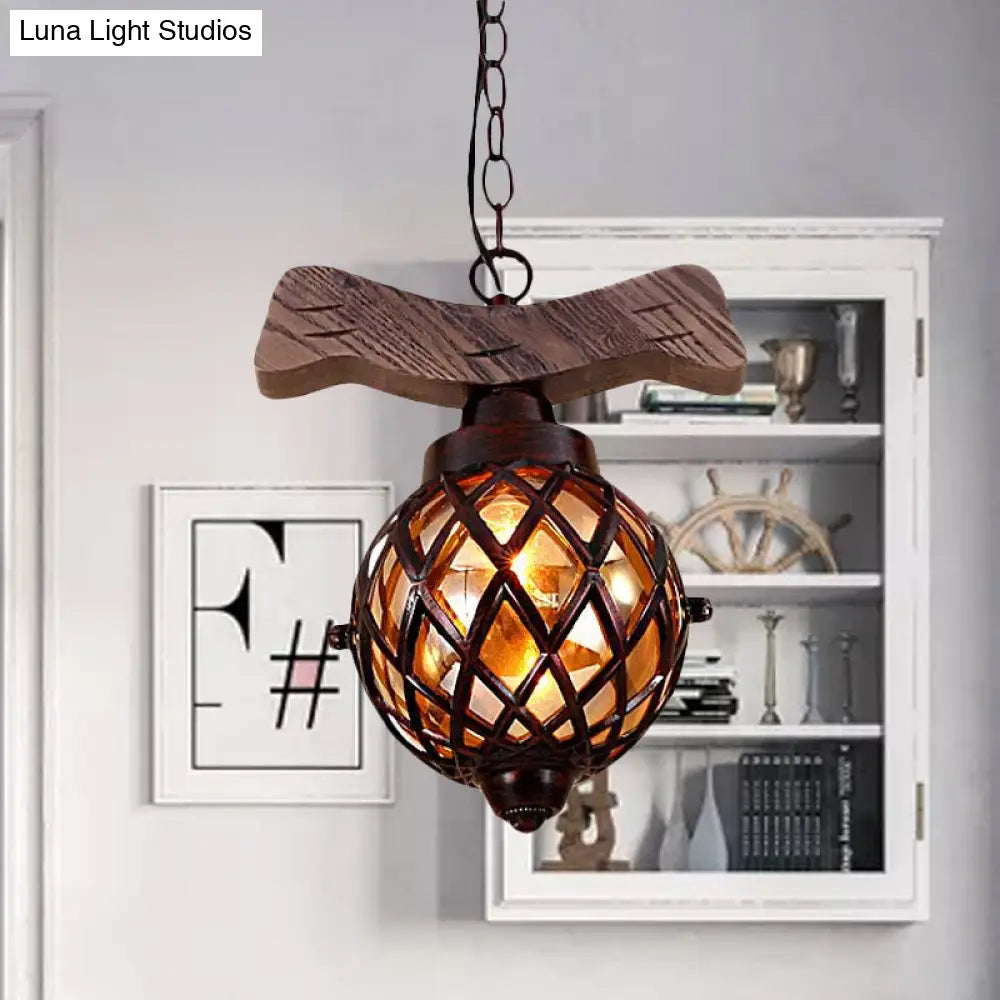 Amber Glass Ball Pendant Lamp With Wooden Base - 1 Light Country Hanging In Copper
