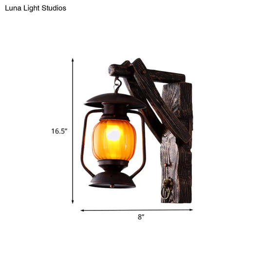 Amber Glass Lantern Wall Light Sconce - Elegant 1-Head Bedroom Lamp In Black With Wood Backplate