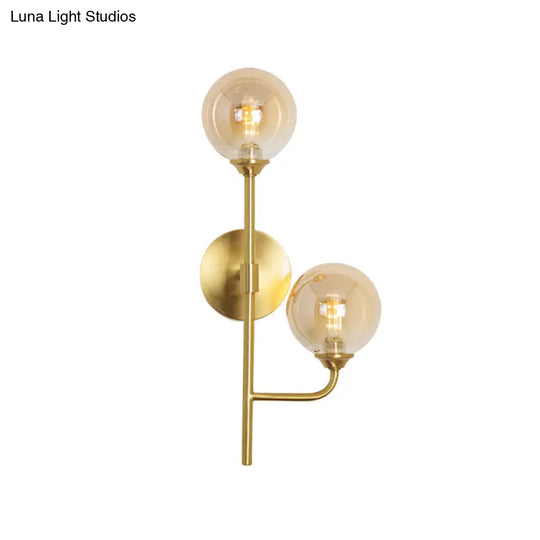 Amber/Smoke Gray Glass 2-Head Led Wall Sconce - Sphere Bathroom Mount Light With Brass Finish