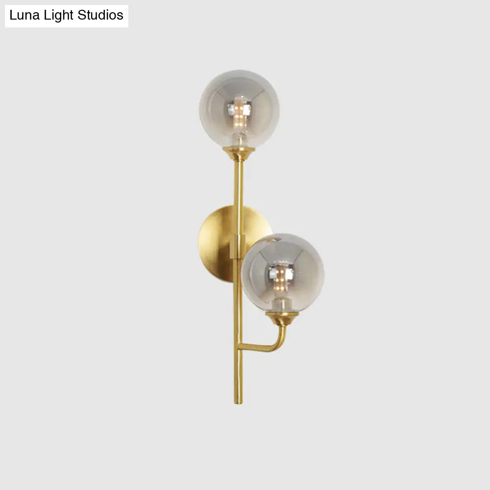 Amber/Smoke Gray Glass 2-Head Led Wall Sconce - Sphere Bathroom Mount Light With Brass Finish