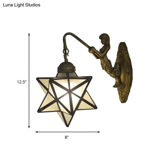 Antique Brass Tiffany Wall Sconce With White Glass Star Illumination And Mermaid Backplate