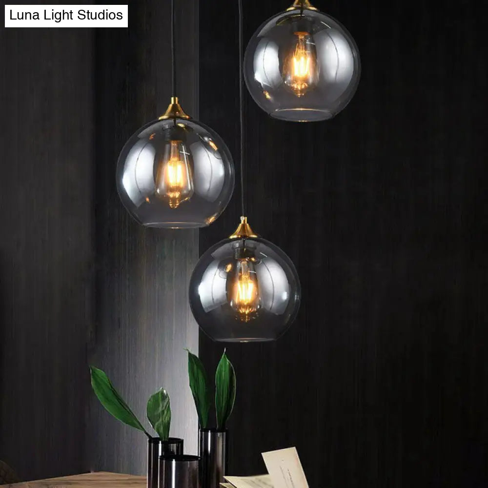 Antiqued Brass Globe Pendant Lamp With 3 Lights And Glass Shade