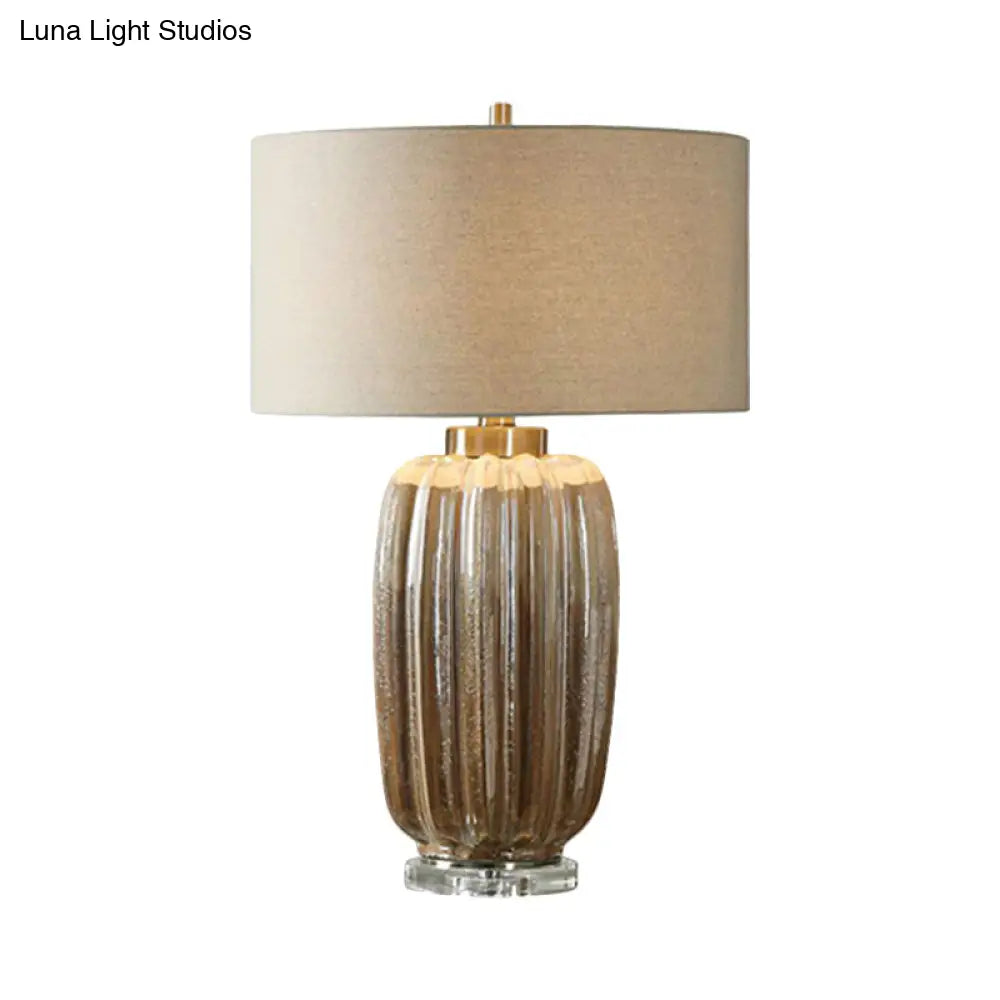 Antiqued Drum Shade Nightstand Lamp With Fabric Desk Light - 1 Bulb Brown
(Note: The Revised Title