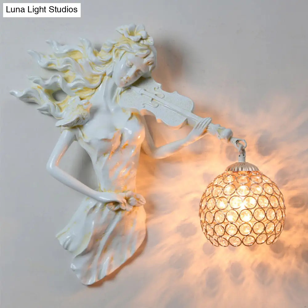 Antiqued Girl With Violin Wall Lamp: Single Bulb Resin Sconce Clear Crystal Shade In White/Gold