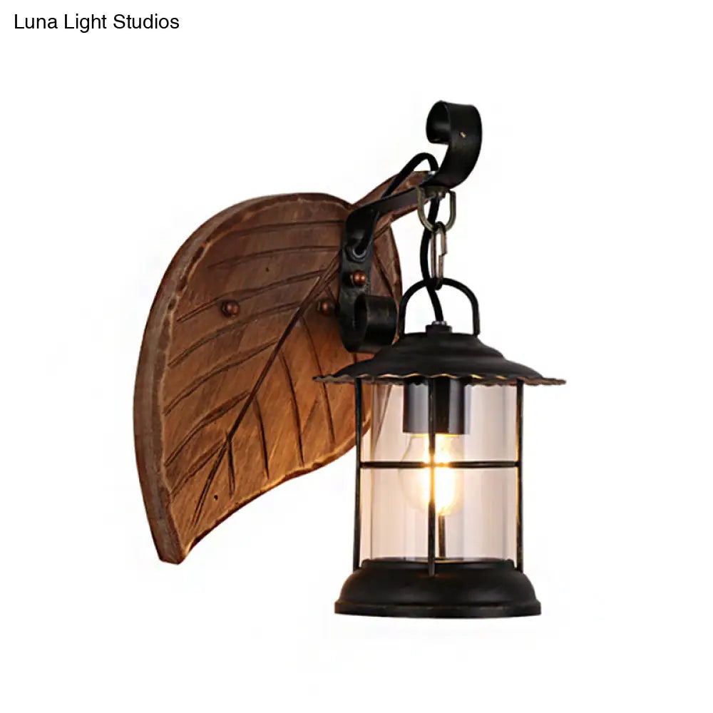 Antiqued Kerosene Wall Sconce With Clear Glass And Wood Leaf/Key Backplate For Dining Room Lighting