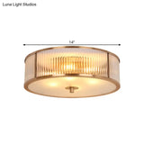 Antiqued Opaline Glass 3-Head Brass Flush Mount Light With Fluted Drum Design For Bedrooms Ceiling