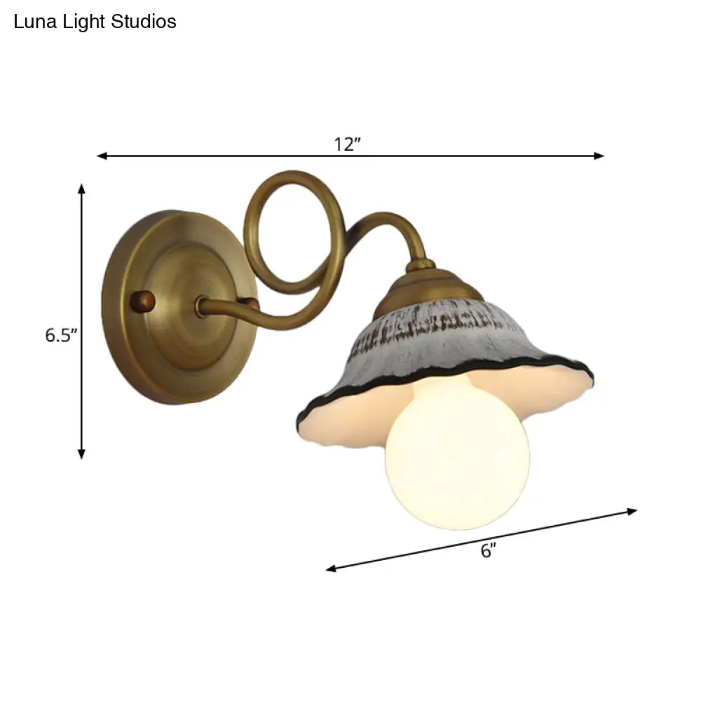 Antiqued Scalloped Wall Lighting: 1-Head Ceramic Sconce With Brass Twisted Arm