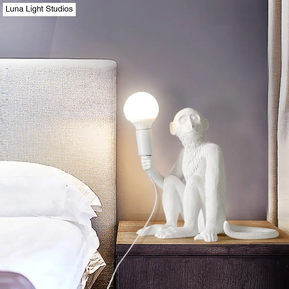 Art Deco 1-Head White Monkey Table Lamp - Stylish Resin Nightstand Light With Unique Shadeless