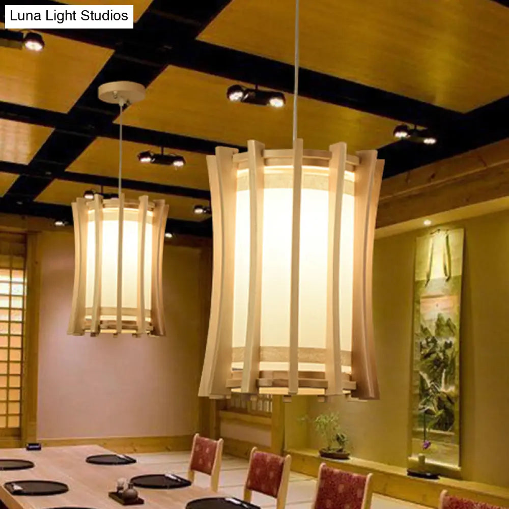 Asia Pvc Pendant Light Fixture: Cylindrical Ceiling Lamp With Wood Cage And Beige Finish