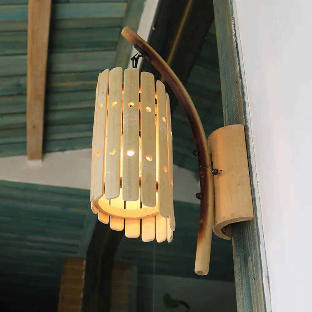 Asian Style Beige 1-Head Corridor Wall Sconce Light With Curved Arm And Wood Cylinder Shade