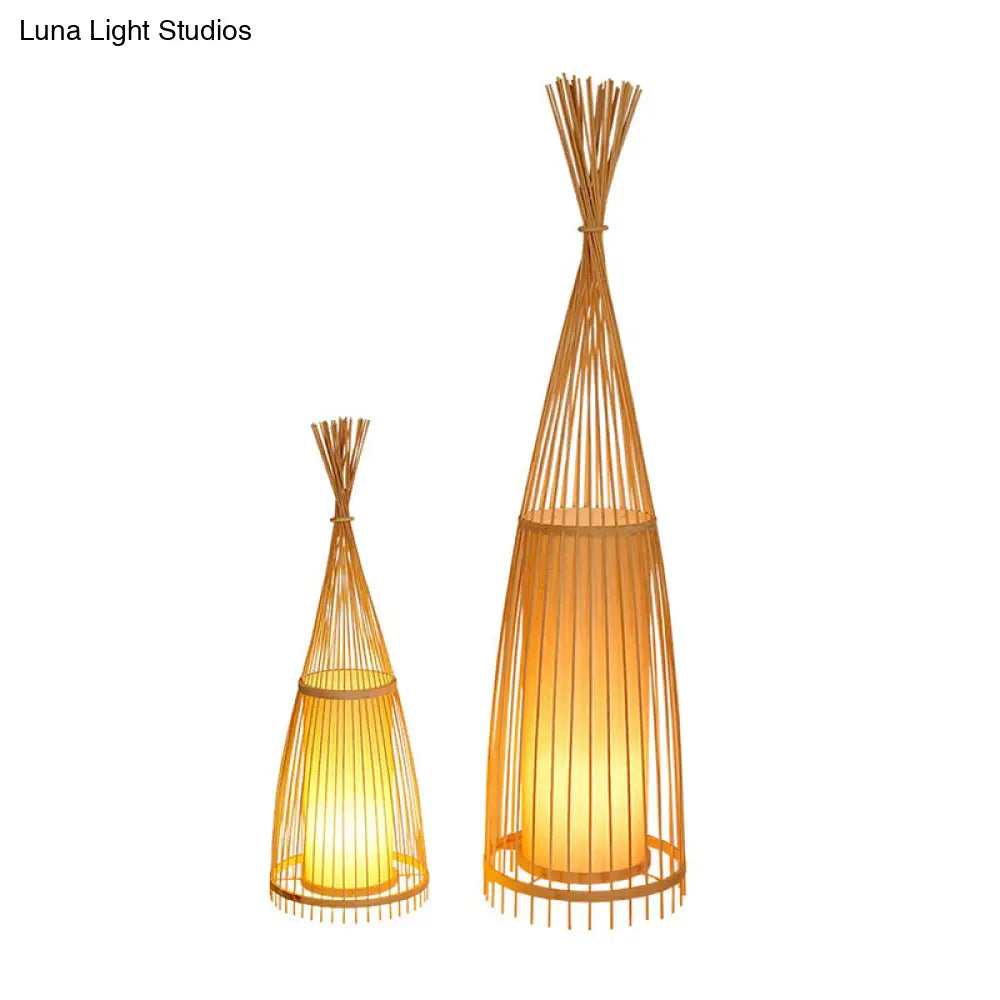 Bamboo Floor Lamp From South-East Asia With Tapered Design And Cylindrical Shade