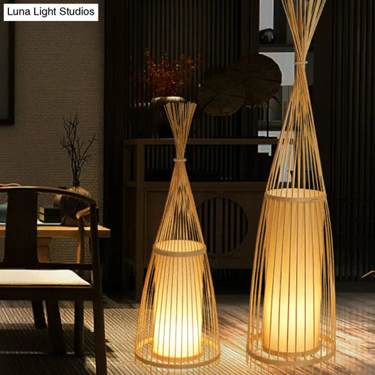 Bamboo Floor Lamp From South-East Asia With Tapered Design And Cylindrical Shade