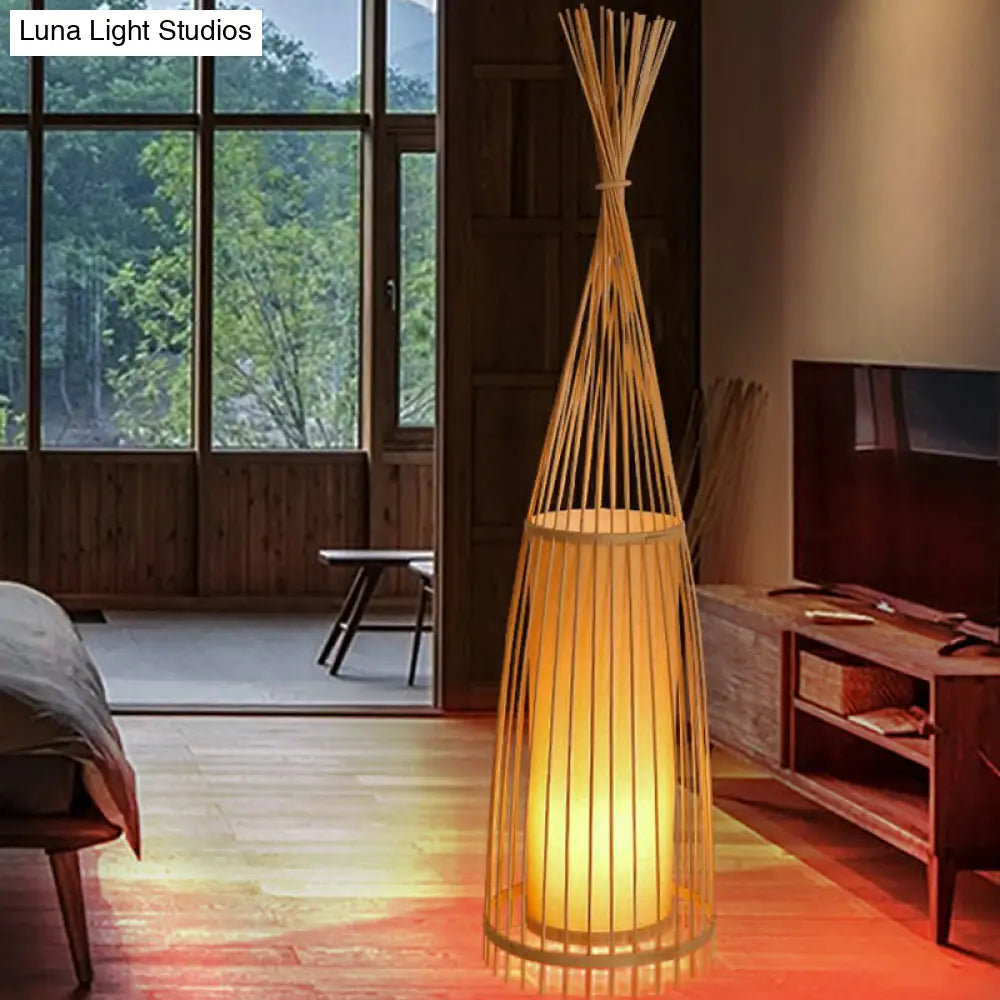 Bamboo Floor Lamp From South-East Asia With Tapered Design And Cylindrical Shade