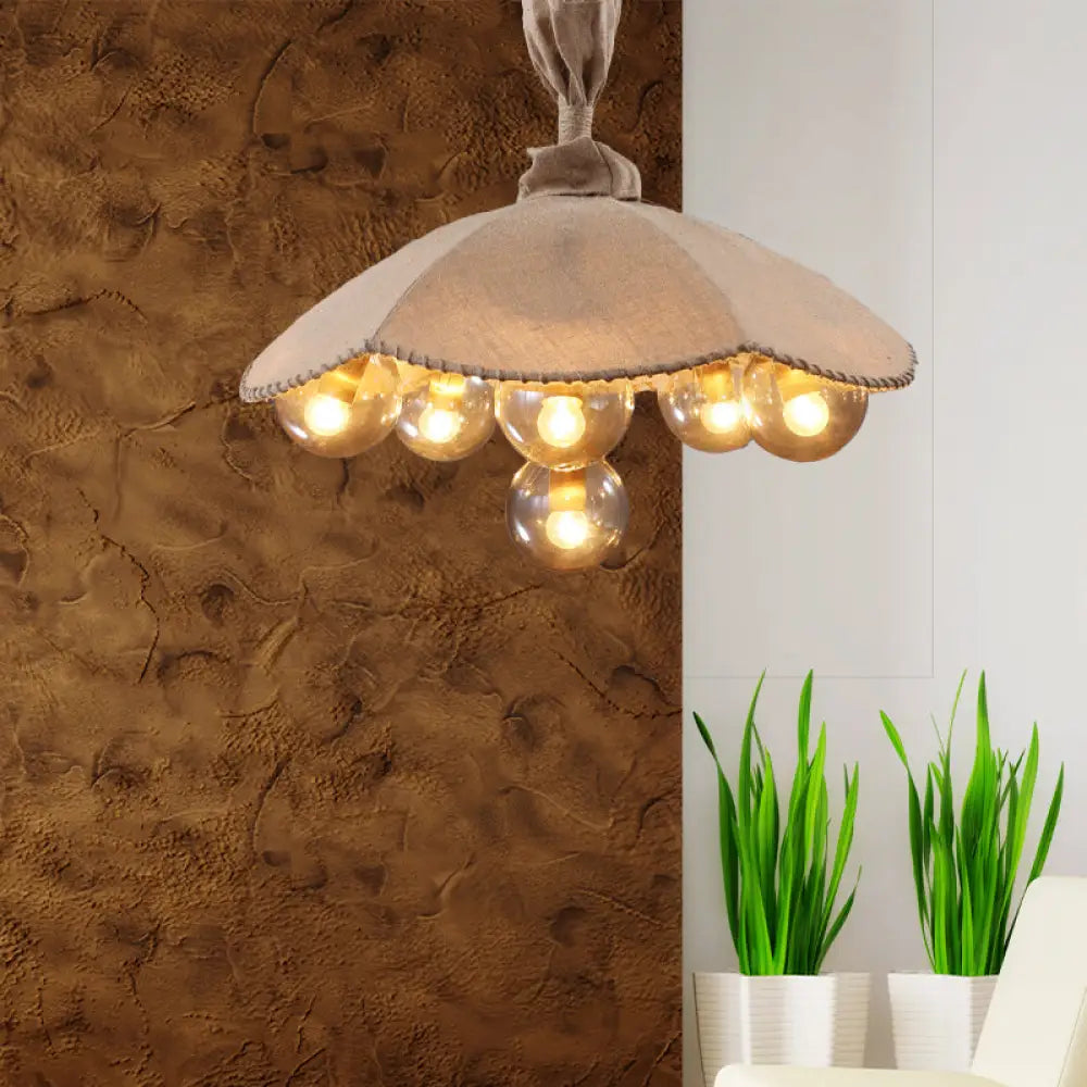 Beige Scalloped Pendant Light: Lodge Chandelier With 6 Fabric Heads & Glass Ball Shade