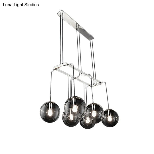 Industrial Black Ball 6-Light Pendant With Clear Glass And Linear Canopy