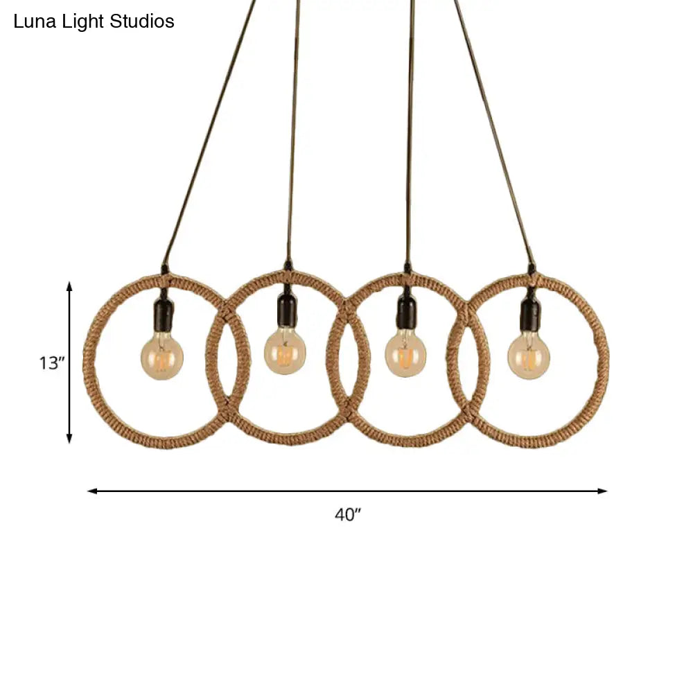 Black Finish Lodge Style Four-Ring Pendant Light With Manila Rope - 4 Lights For Coffee Shop