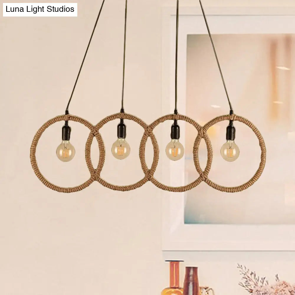 Black Finish Lodge Style Four-Ring Pendant Light With Manila Rope - 4 Lights For Coffee Shop
