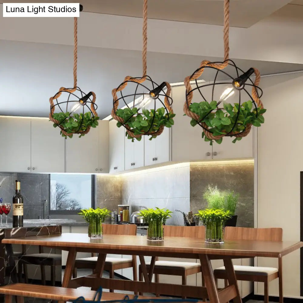 Black Round Metal Pendant Lamp - Lodge Style With Rope And Artificial Leaf