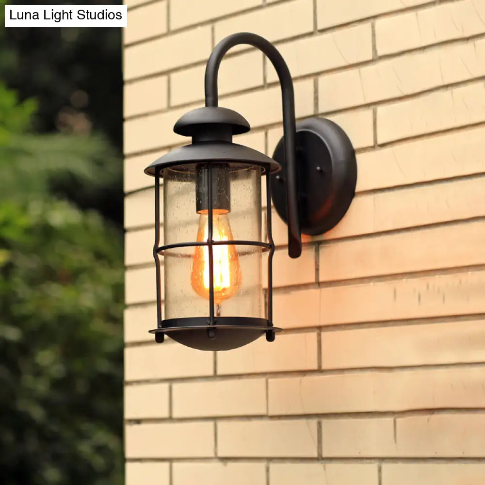 Black Seeded Glass Wall Sconce With Cage - Traditional 1-Light Fixture