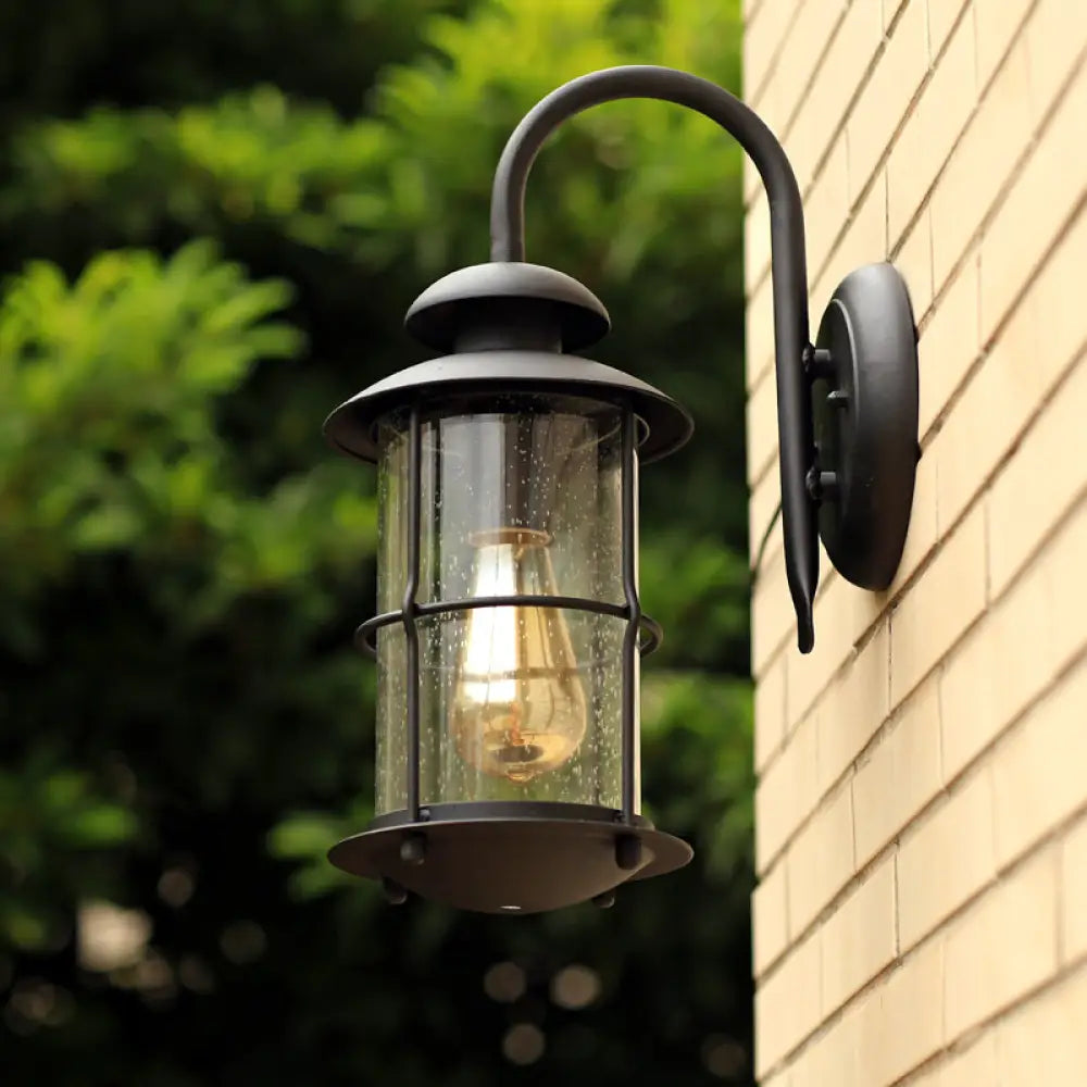 Black Seeded Glass Wall Sconce With Cage - Traditional 1-Light Fixture