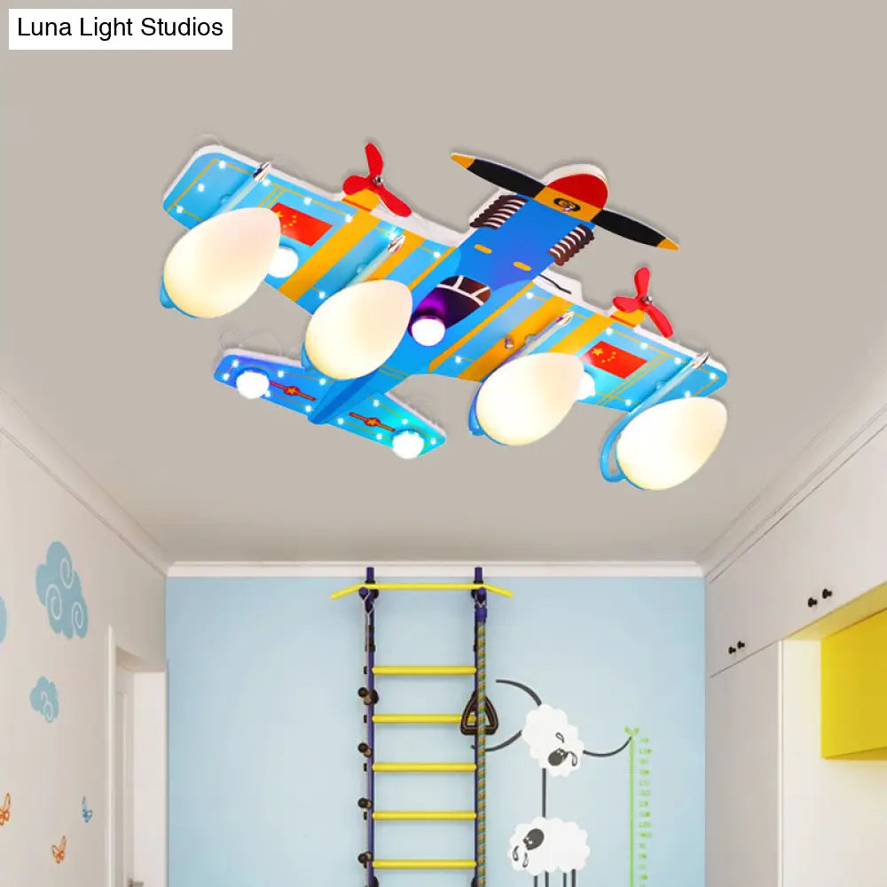 Blue Acrylic Fighter Jet Ceiling Light For Boy’s Bedroom - 4 Head Flush Mount Fixture