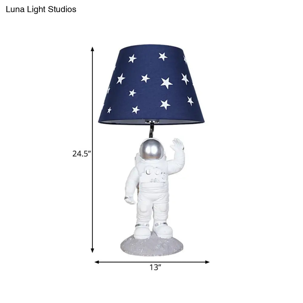 Blue Empire Shade Night Lamp - Kids Star Patterned Fabric Table Lighting With Carved Spaceman Base