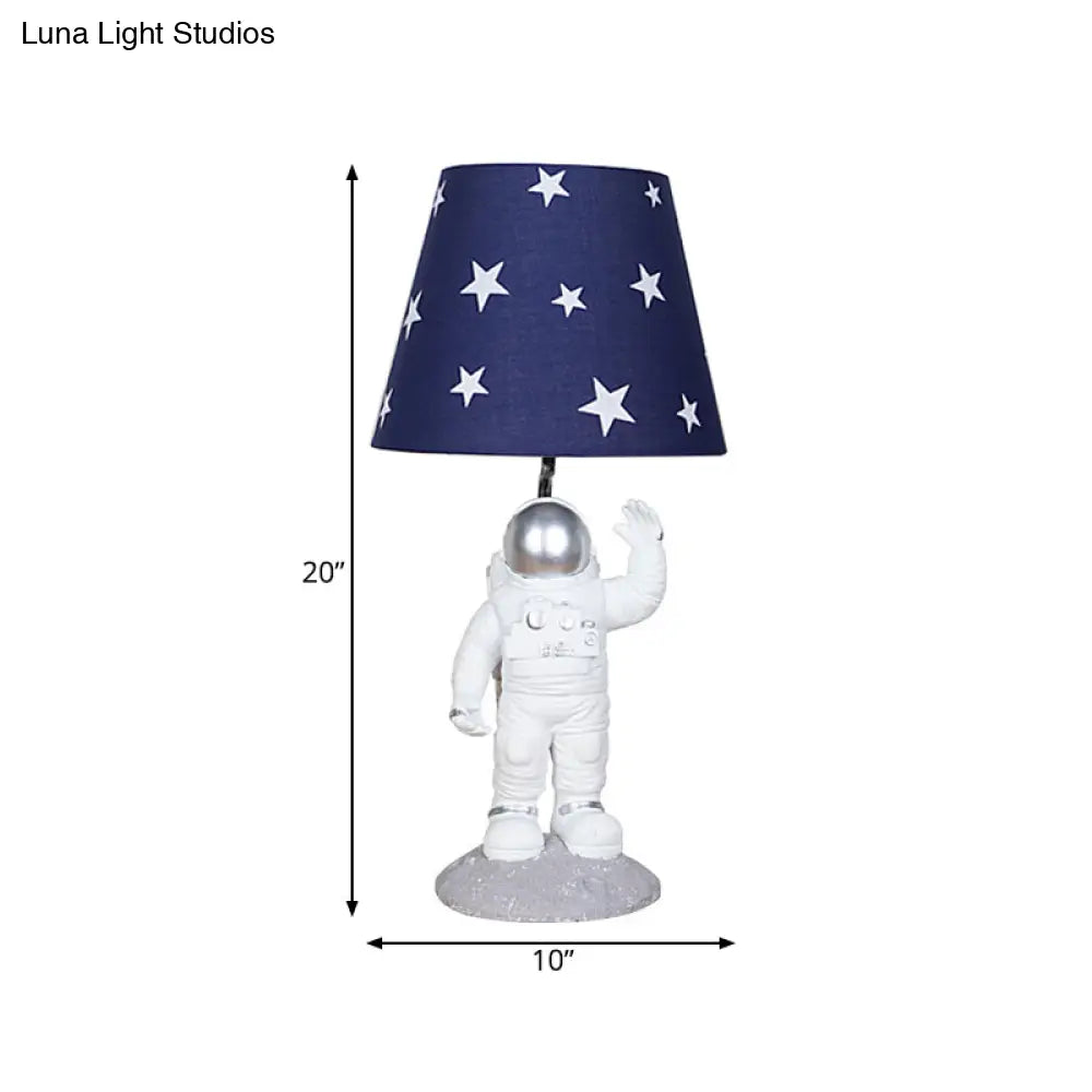 Blue Empire Shade Night Lamp - Kids Star Patterned Fabric Table Lighting With Carved Spaceman Base