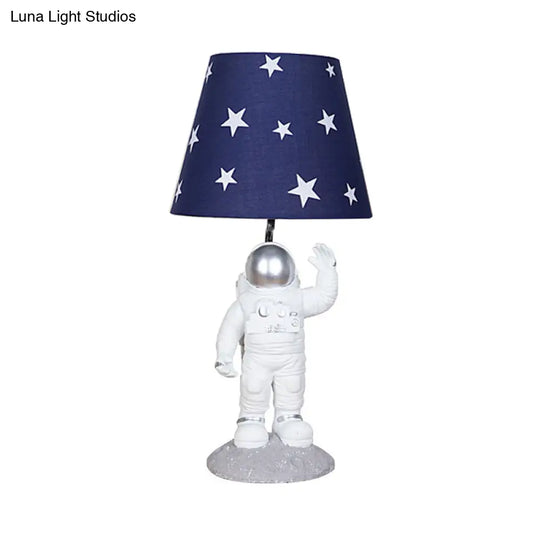 Blue Empire Shade Night Lamp - Kids Star Patterned Fabric Table Lighting With Carved Spaceman Base