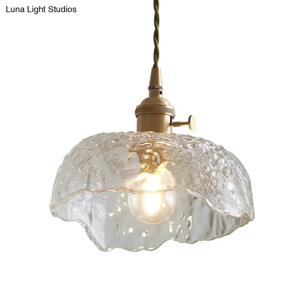 Clear Textured Glass Pendant Light With Brass Floral Rim