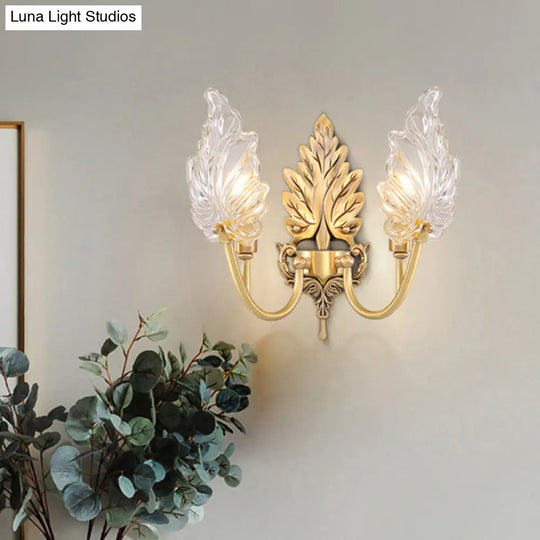 Brass Arched Wall Sconce With Clear Glass And Palm Leaf Design 1-2 Lights