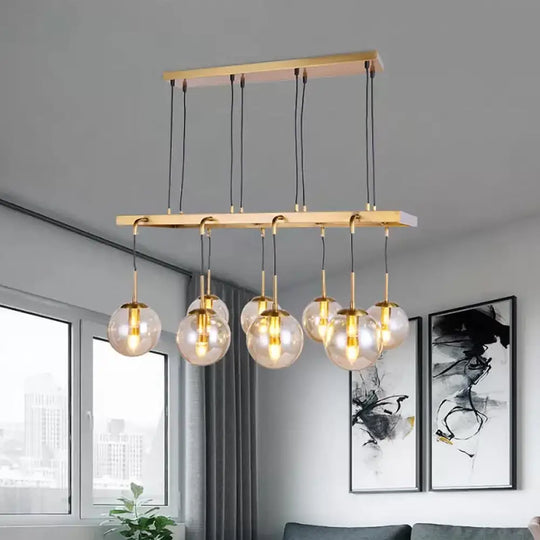 Brass Ball Island Pendant Light With Clear Glass Shade - Modern 8 Head Design