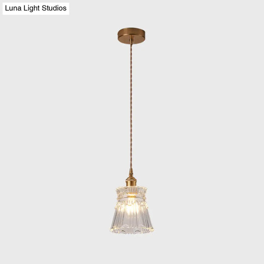 Modern Brass Bedside Pendant Lamp With Clear Glass Shade - Single-Bulb Pendulum Light / Flare