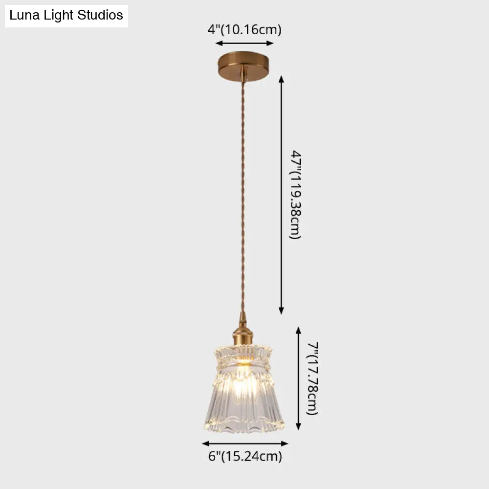 Modern Brass Bedside Pendant Lamp With Clear Glass Shade - Single-Bulb Pendulum Light