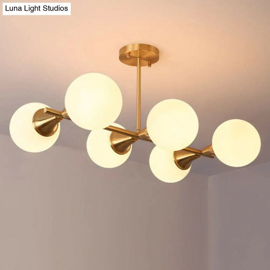 Brass Finish 6-Light Postmodern Linear Island Pendant With Glass Ball Shade