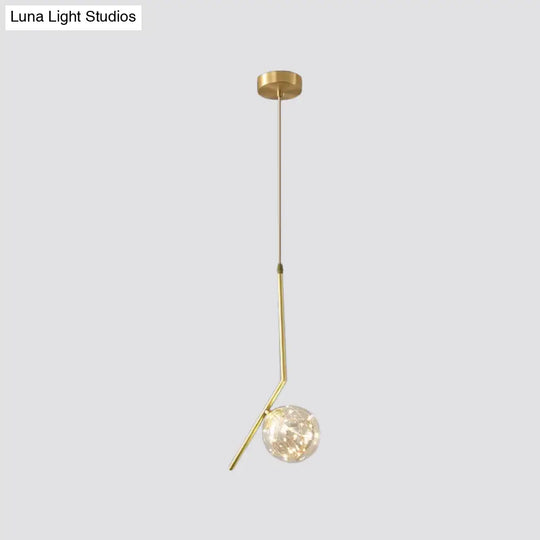 Sleek Brass Sphere Led Pendant Lamp For Modern Dining Rooms