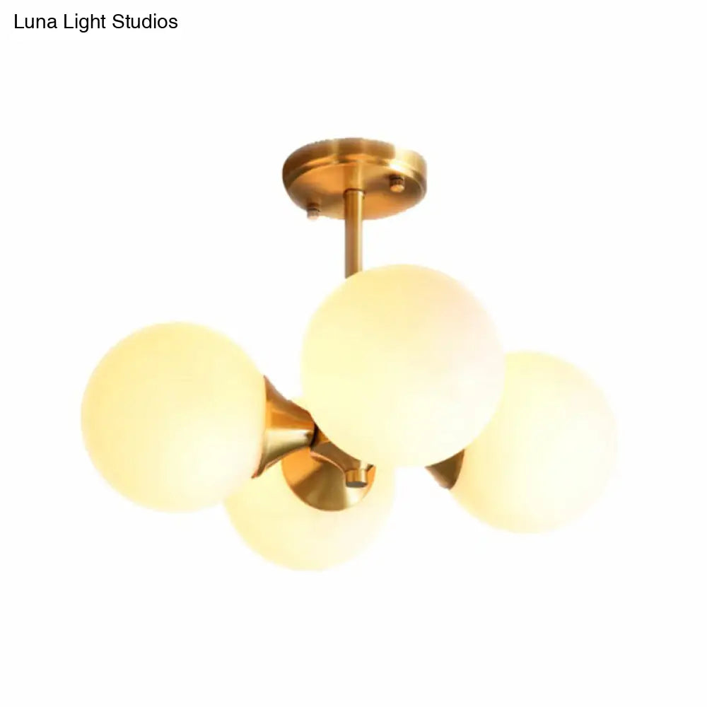 Brass Globe Semi Flush Mount Light With Opal Glass - Postmodern Design For Bedroom