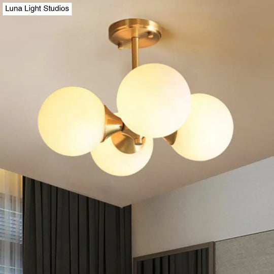 Brass Globe Semi Flush Mount Light With Opal Glass - Postmodern Design For Bedroom