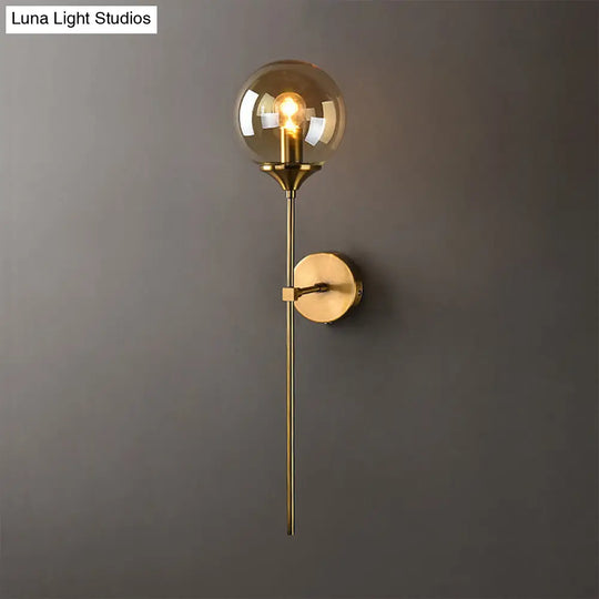 Brass Globe Shade Wall Sconce - Modern Single Bulb Clear/Grey/Amber Glass Light For Bedroom