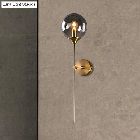 Brass Globe Shade Wall Sconce - Modern Single Bulb Clear/Grey/Amber Glass Light For Bedroom