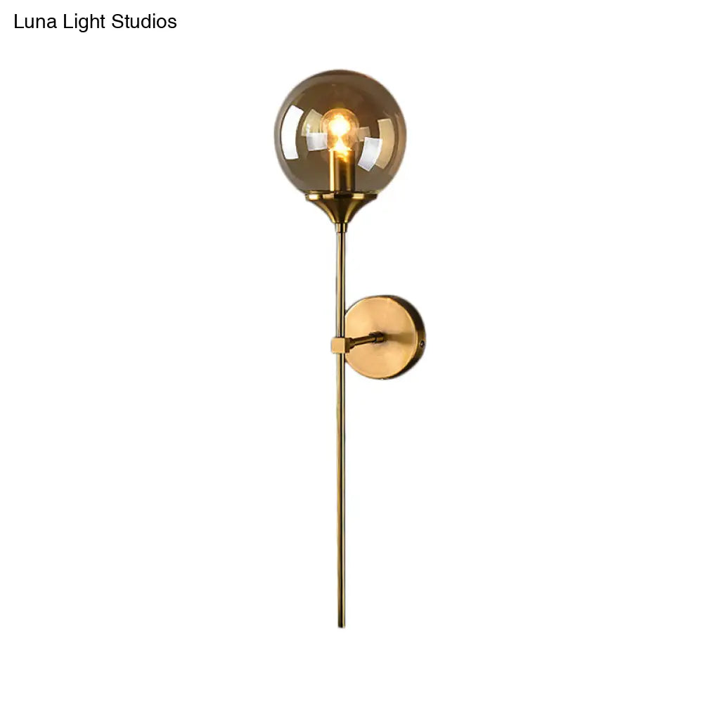 Brass Globe Shade Wall Sconce - Modern Single Bulb Clear/Grey/Amber Glass Light For Bedroom