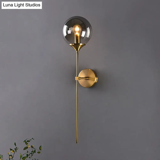 Brass Globe Shade Wall Sconce - Modern Single Bulb Clear/Grey/Amber Glass Light For Bedroom