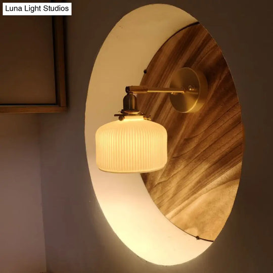 Brass Pivot Joint Foyer Sconce: Round Ribbed Glass Wall Light With White Simplicity (1 Bulb)