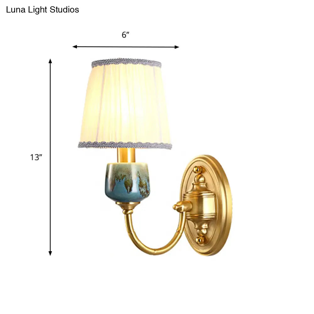 Brass Wall Hanging Light With Classic Swooping Arm And Fabric Shade