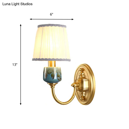 Brass Wall Hanging Light With Classic Swooping Arm And Fabric Shade