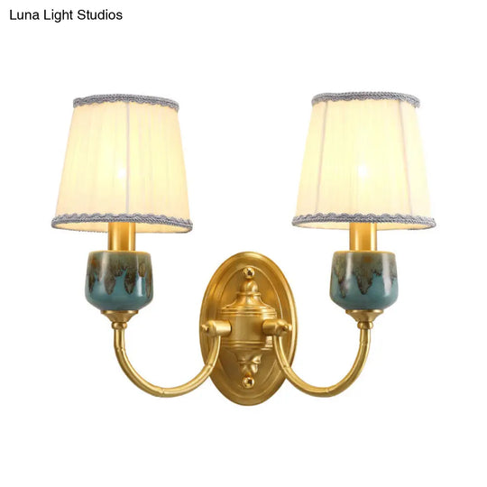 Brass Wall Hanging Light With Classic Swooping Arm And Fabric Shade